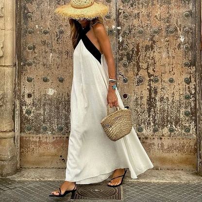 Vestido elegante con espalda cruzada y contraste de color