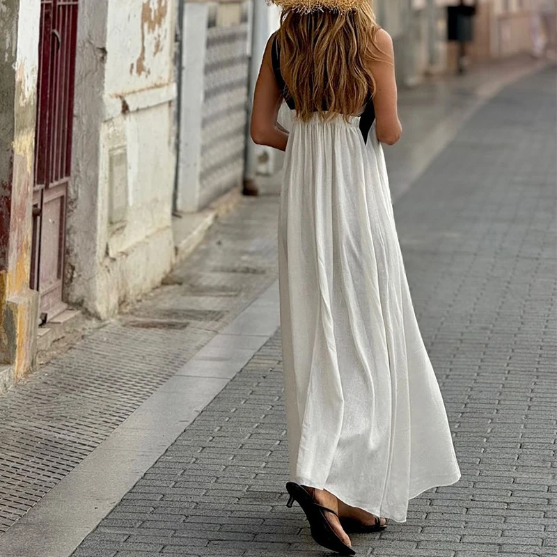 Vestido elegante con espalda cruzada y contraste de color